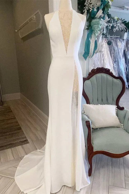 Vestido de novia largo estilo sirena con cuello halter y espalda abierta